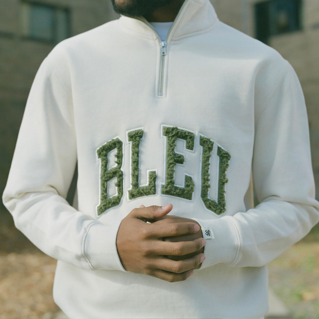 Regular fit Heavyweight, 10.3 oz Sherpa fabric logo Applique Woven cuff tag Half Zip Sweatshirt