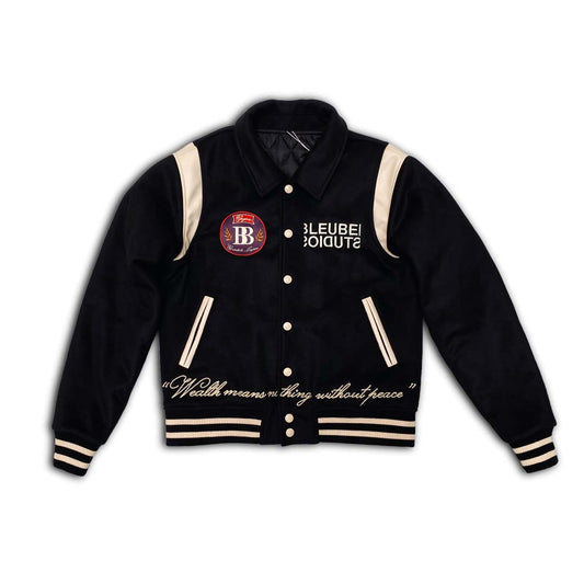 Black Melton body and sleeves/neck fabric Cream Leather shoulder and pocket Cream buttons Black and cream stripe rib design for the cuffs and hem Embroidered logo patch on front left chest Embroidered logo on right left chest Chainstitch embroidery quote on waistline Embroidery doves logo on back